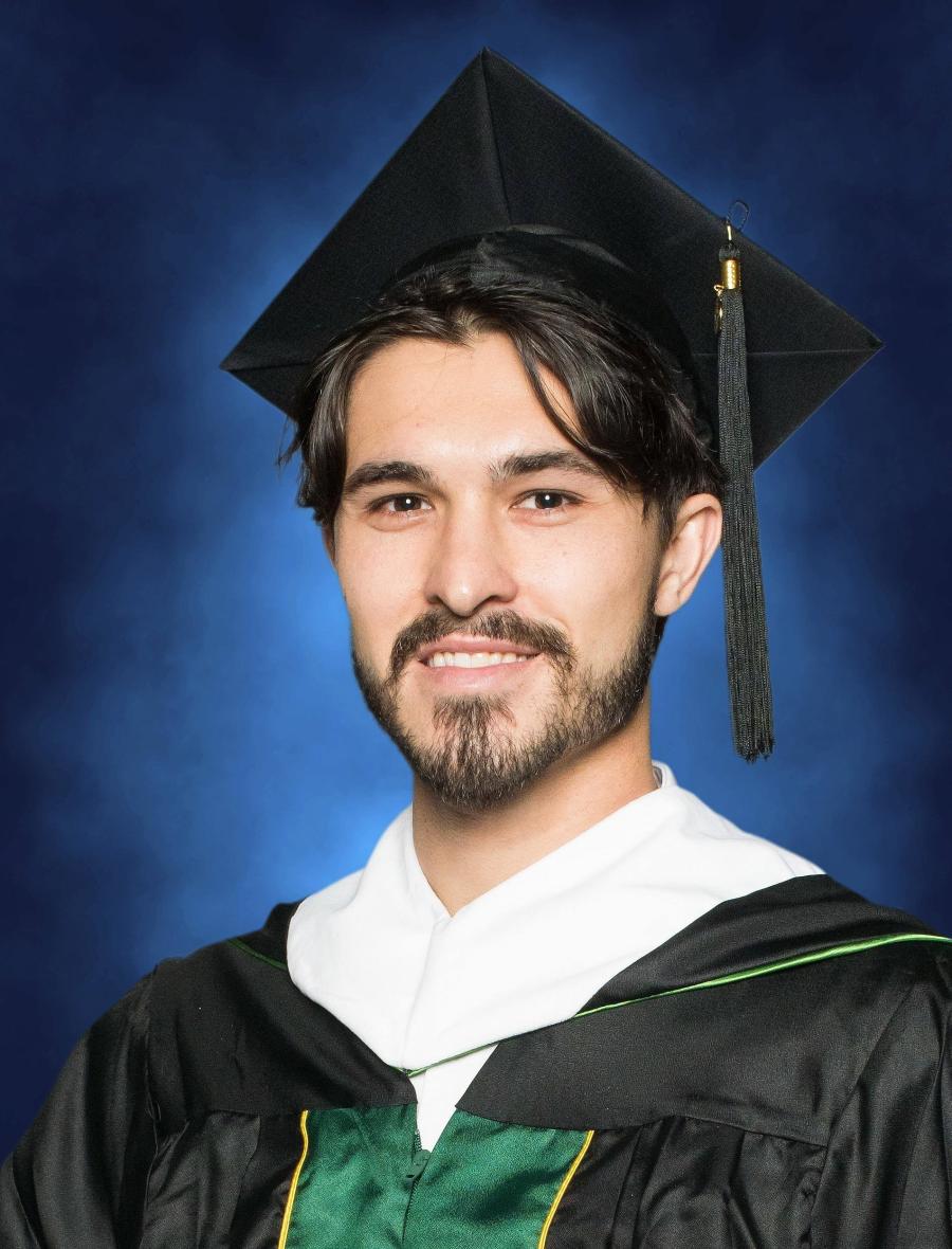 young man in cap and gown